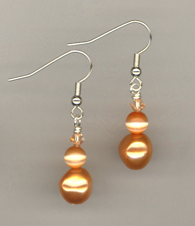 orange pearl cat's eye crystal earrings